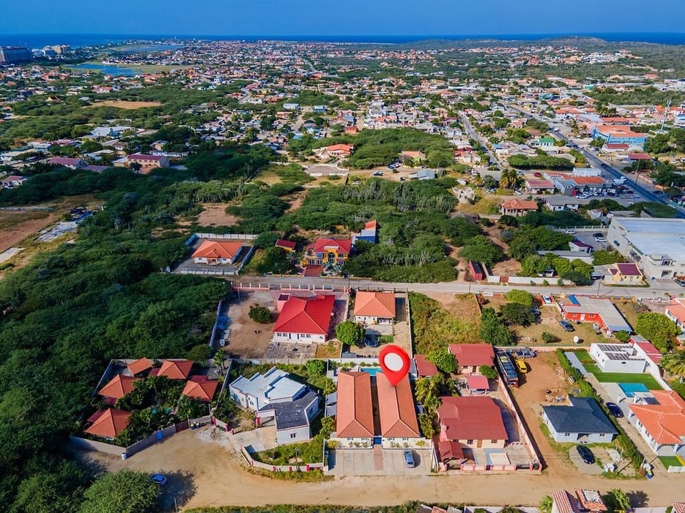 The aerial view of the property and neighborhood.