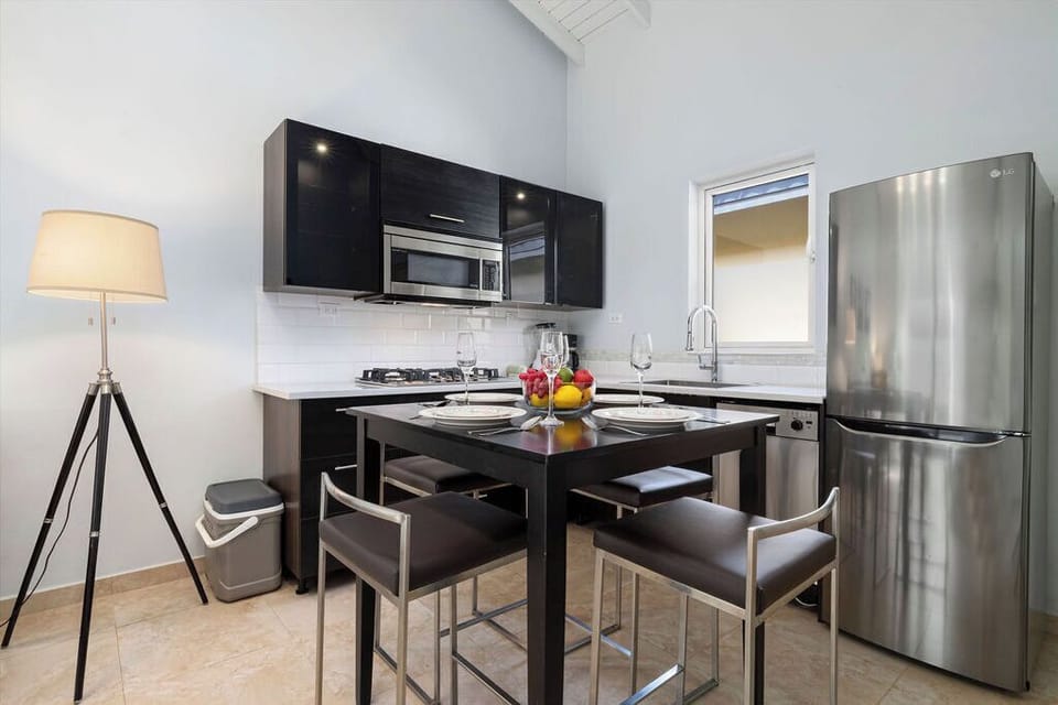 A dining area that can be serve 4 people with  a fully equipped kitchen.