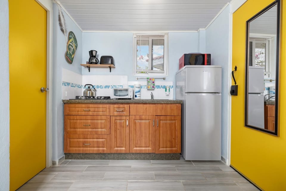 The well-equipped kitchenette allows you to eat in.  Dishes, pots, pans, cutlery, a coffee maker, a microwave and a toaster oven are provided.