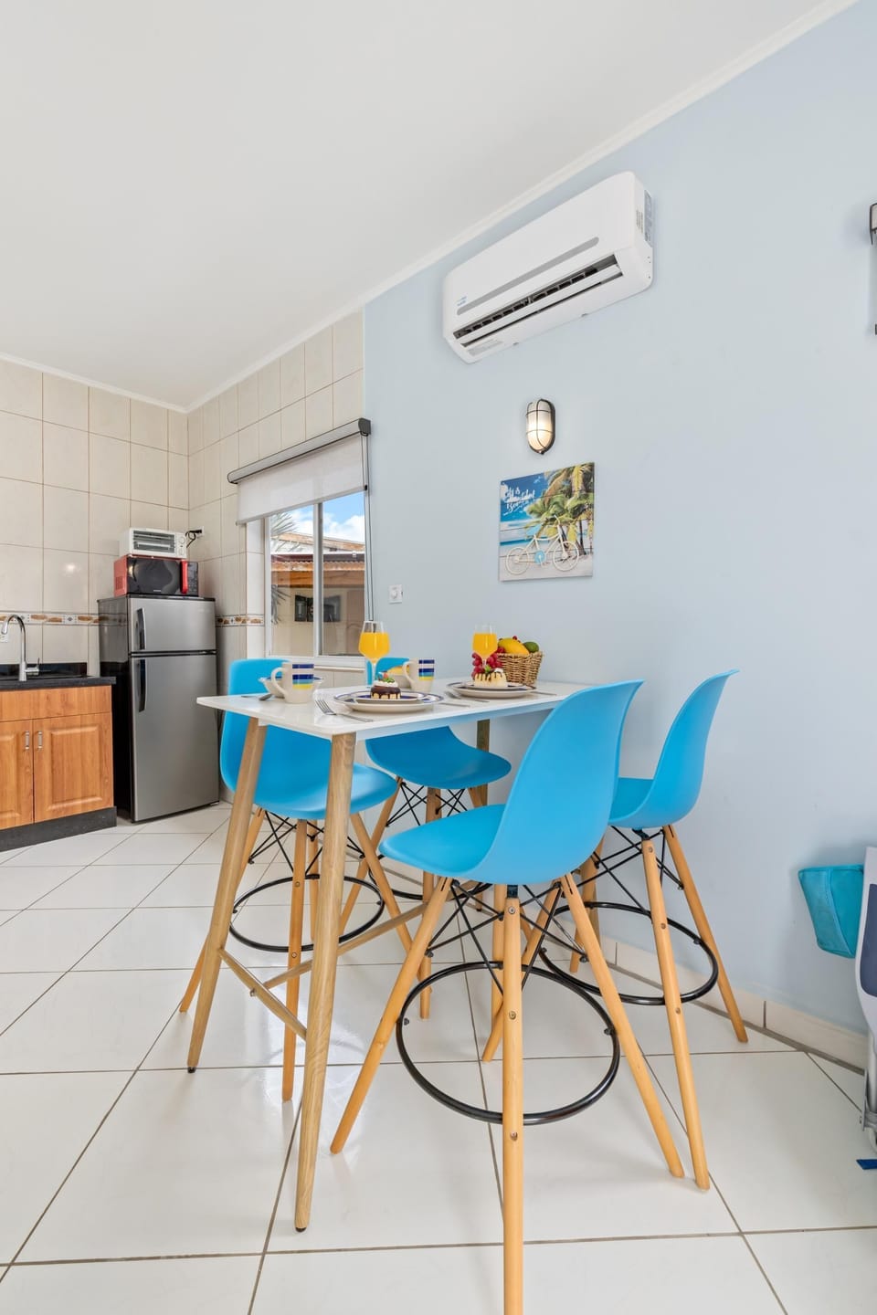 A dining area with seating for 4 to enjoy a delicious meal.