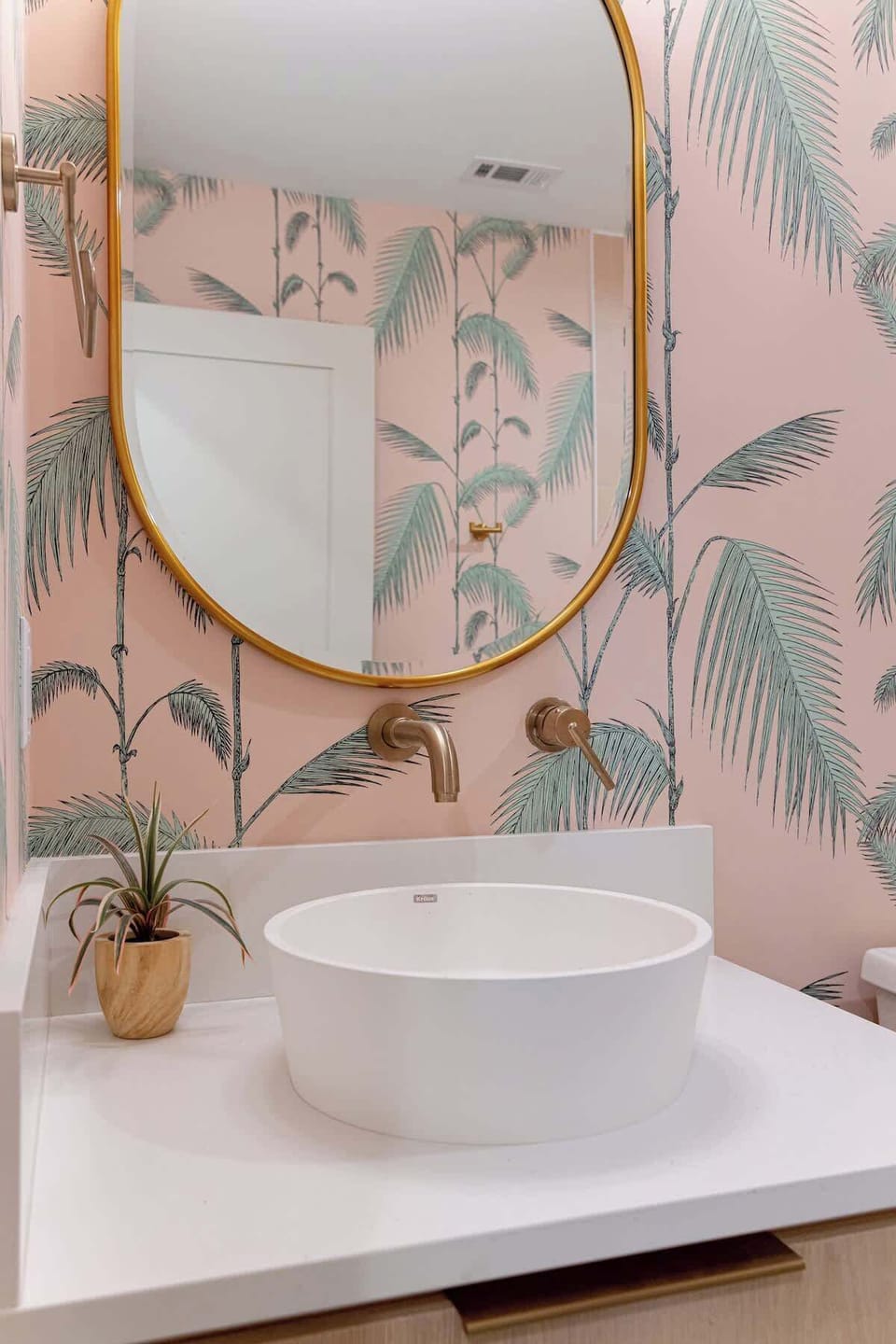 Bathroom 2 is shared by Bedrooms 2 and 3 and has a shower/tub combination