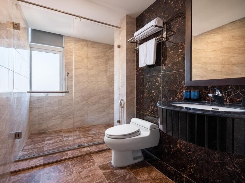 Premium Room | Bathroom | Designer toiletries, hair dryer, bathrobes, slippers