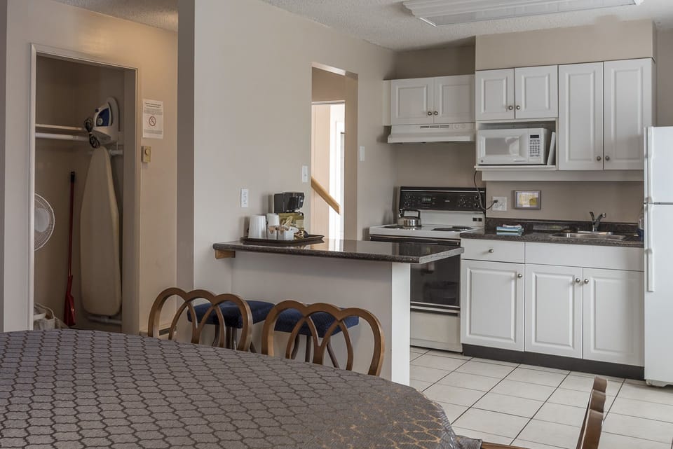 Superior Suite, 2 Bedrooms, Balcony | Private kitchen | Fridge, microwave, coffee/tea maker