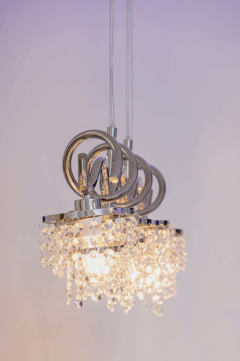 A close-up of a beautiful chandelier, adding luxury to the interior design.
