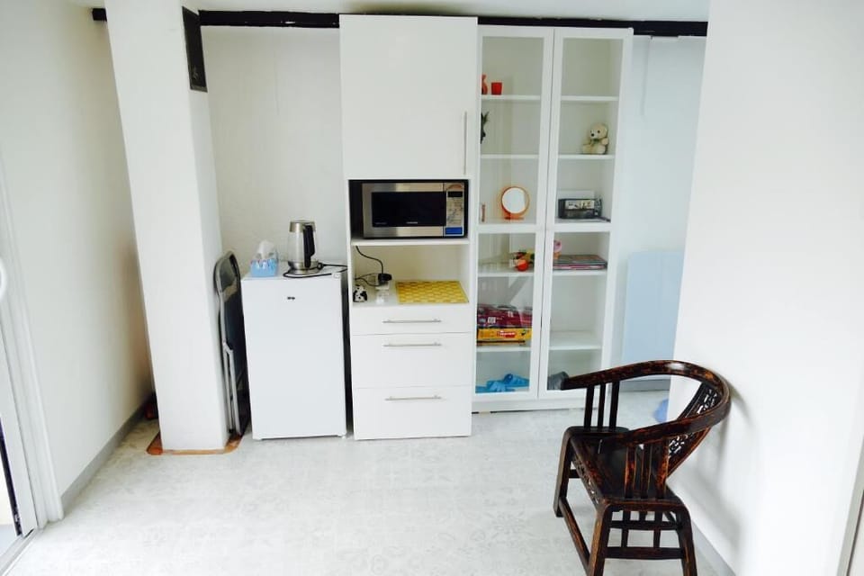 Microwave, espresso maker, electric kettle, coffee grinder