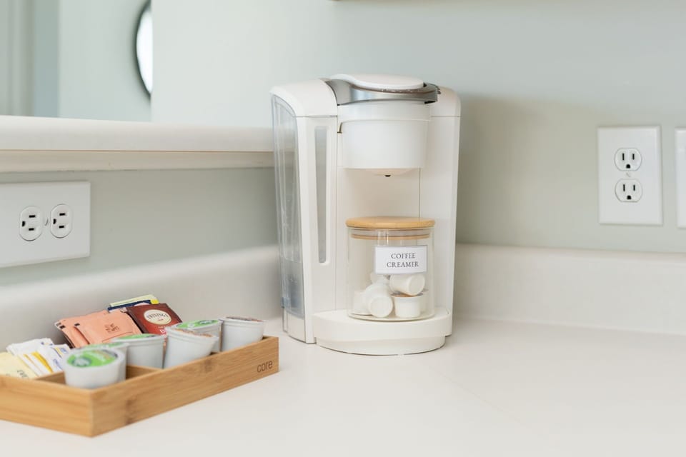 Keurig coffee & condiments is provided