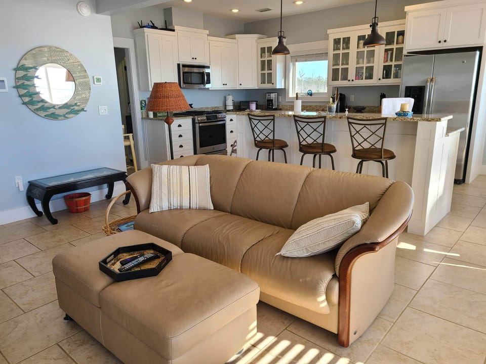 First floor sofa and kitchen