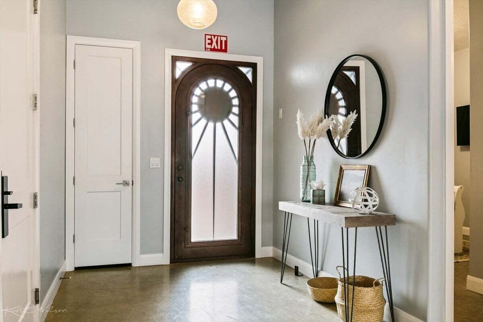 Front Entryway Console, Storage Closet, and interior Garage Entrance.