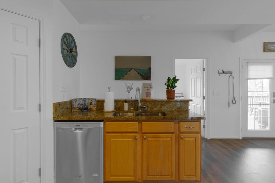 Sink with stainless steel dishwasher for no hassle clean up!