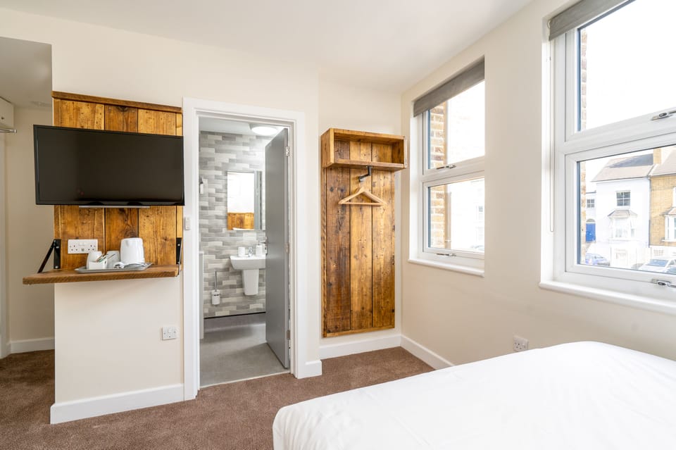 Classic Quadruple Room | Blackout drapes, iron/ironing board, free WiFi