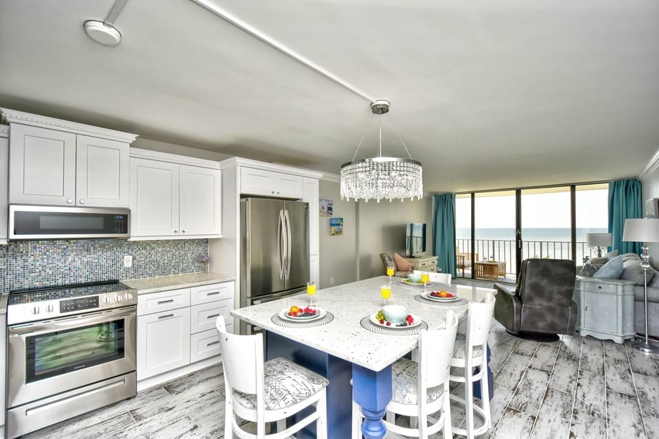 Open floor plan. Dining area seats 4.