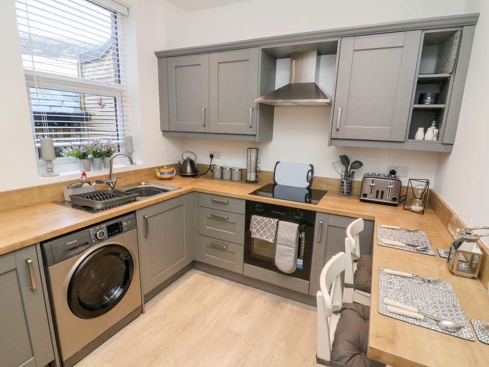 Fridge, electric kettle, toaster, cookware/dishes/utensils