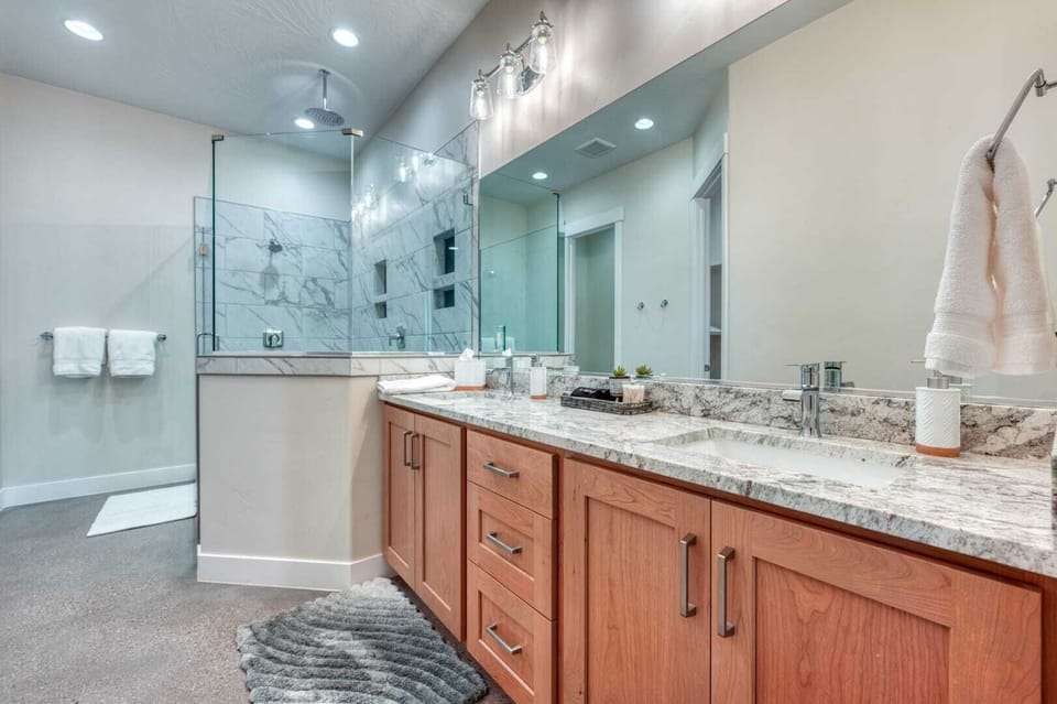 Master Ensuite Bathroom 2 (upstairs) also features a double vanity and walk-in shower with complimentary shampoo, conditioner & body wash.