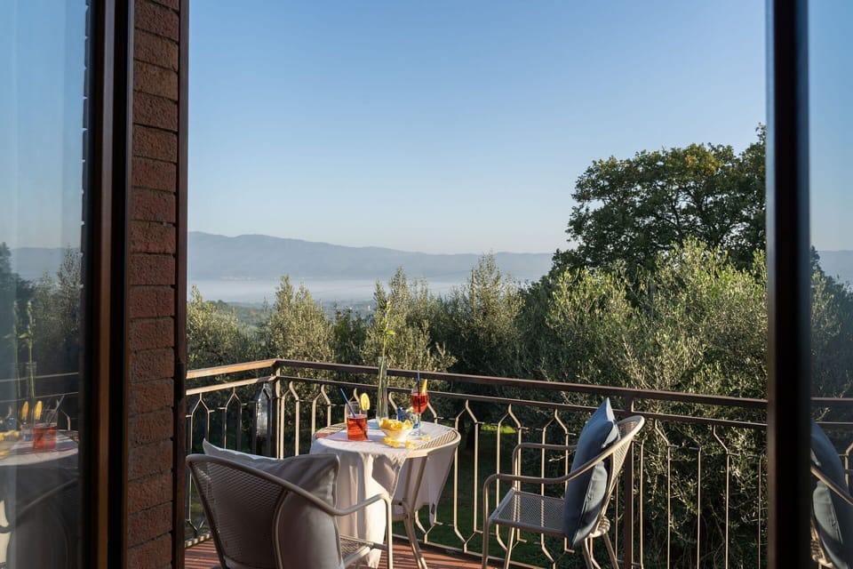 Sky, Table, Nature, Building, Chair, Tree, Tableware, Architecture, Porch, Flowerpot