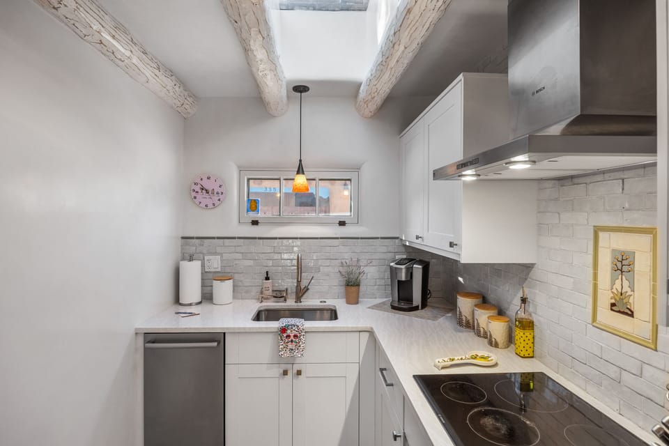Cabinets are full of dinner/glass ware for dining