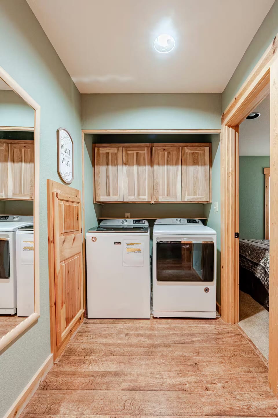 Laundry space near both downstairs bedrooms.