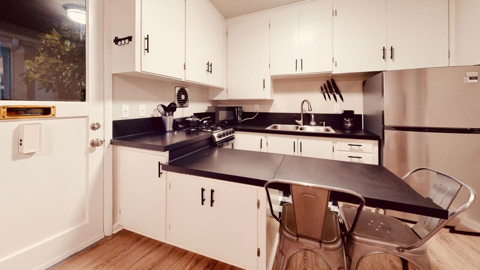 Gas stove & oven, and all utensils.
