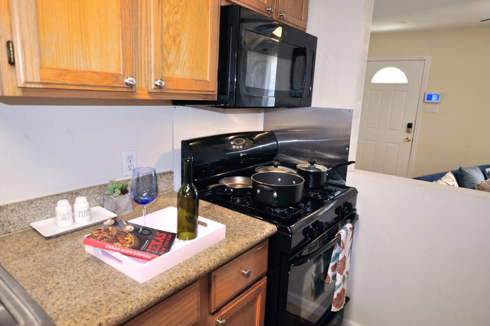Full kitchen with dishwasher/stove/oven/microwave/coffee maker/Fridge.