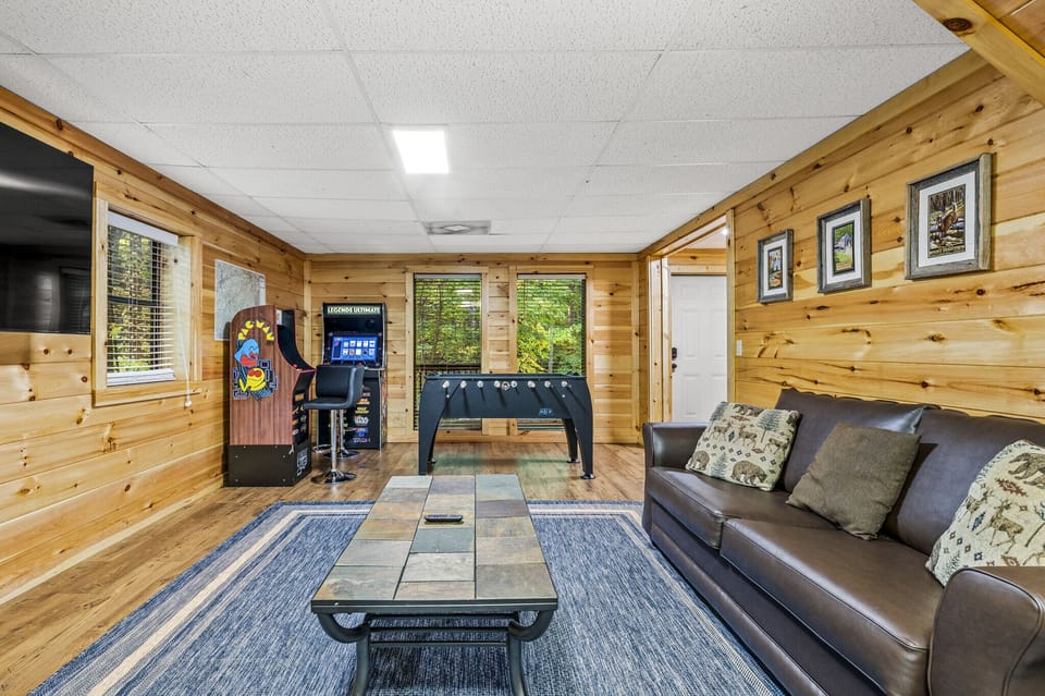 Game room has a comfortable sleeper sofa 