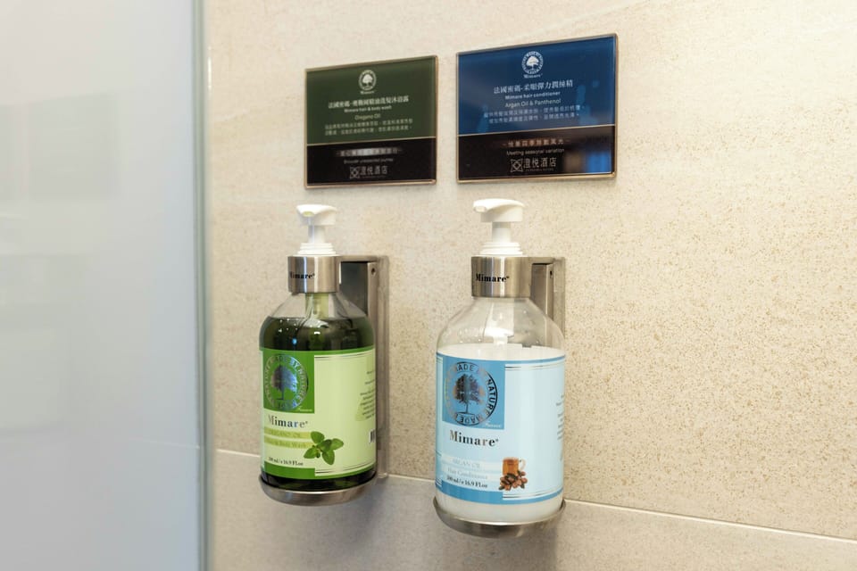 Exclusive Quadruple Room | Bathroom | Free toiletries, hair dryer, slippers, electronic bidet