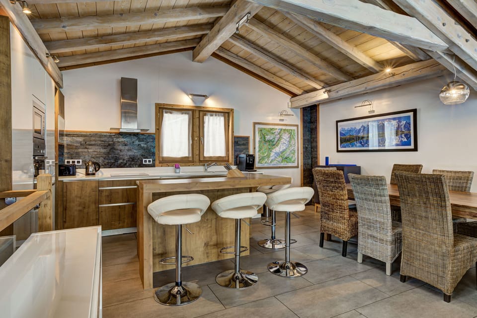 Kitchen with island and bar stools