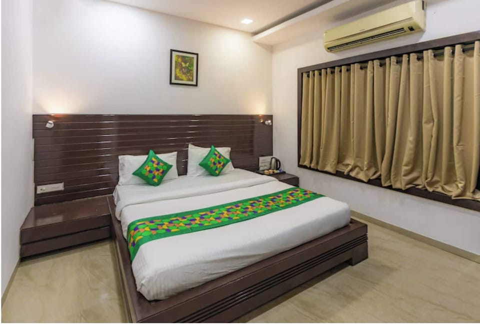 Standard Room | Individually furnished, desk, blackout drapes, iron/ironing board