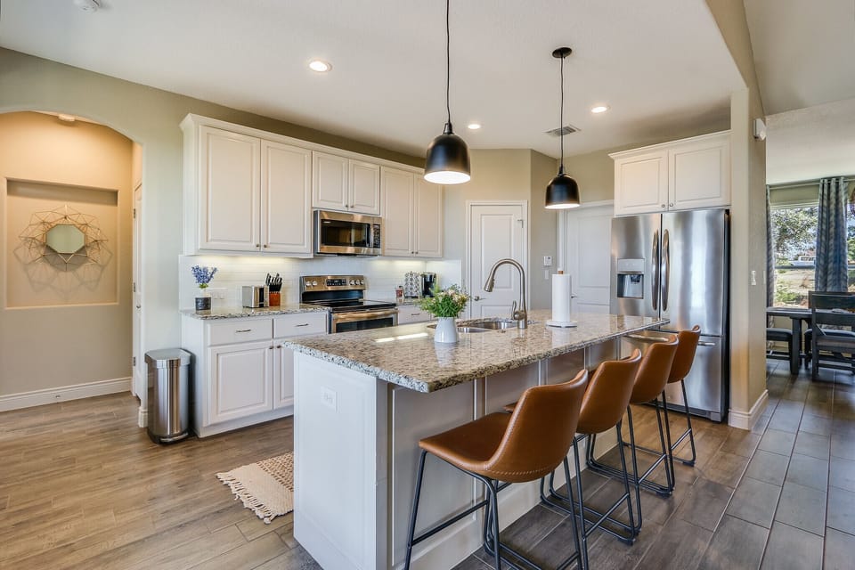 Full kitchen with stainless steel appliances