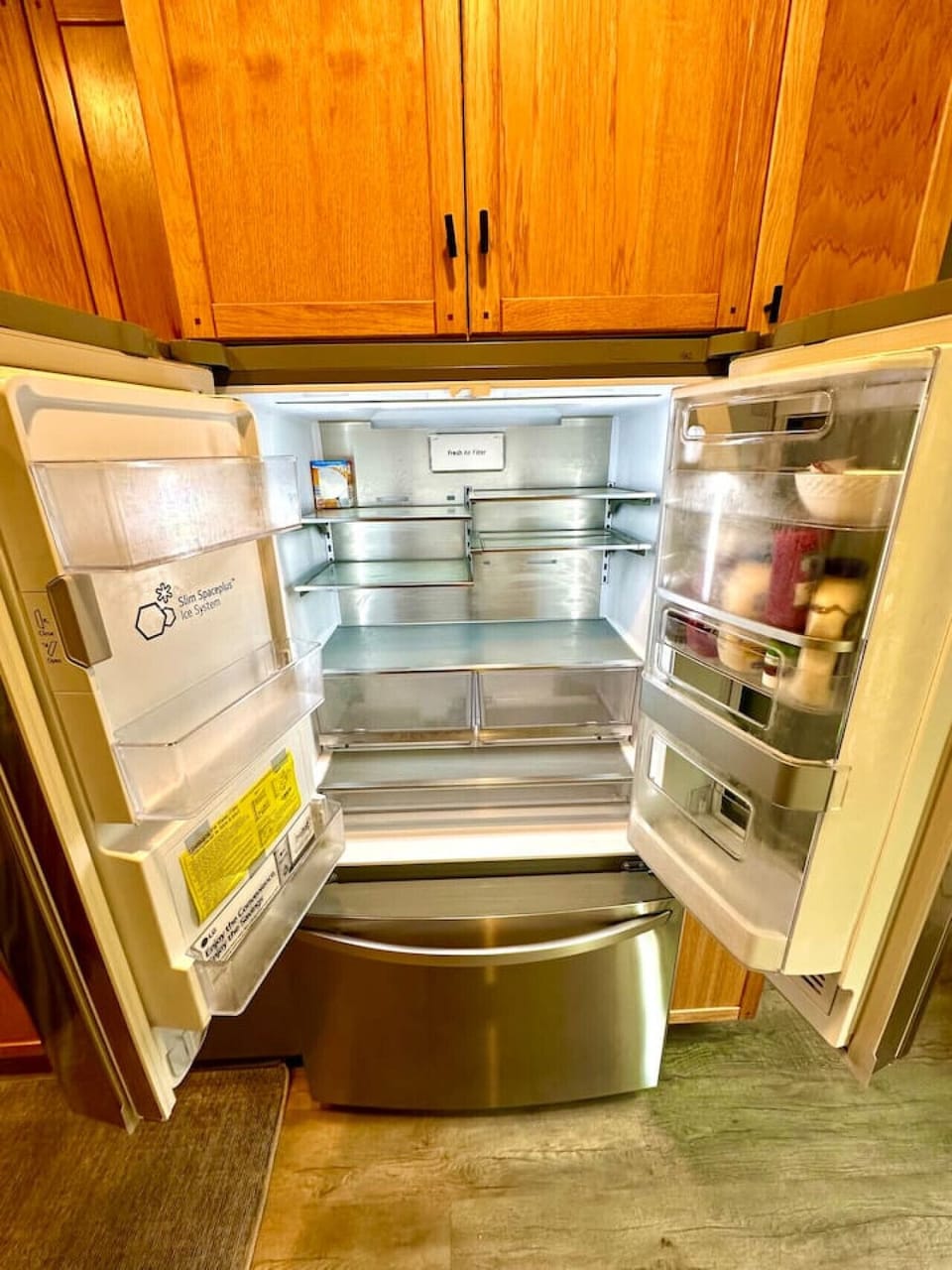 Your large-capacity Fridge and Freezer (below) have all the space you`ll need and the freezer makes cool round ice cubes!!