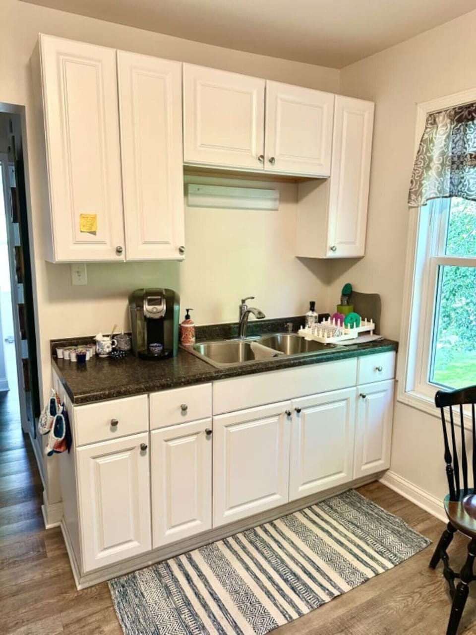 A Keurig coffee maker and coffee pods are here for you, and a Graco high chair (not pictured) is also available.