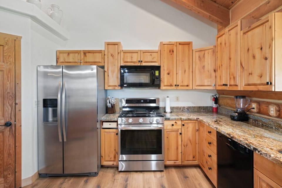 Our kitchen is complete with all your needs