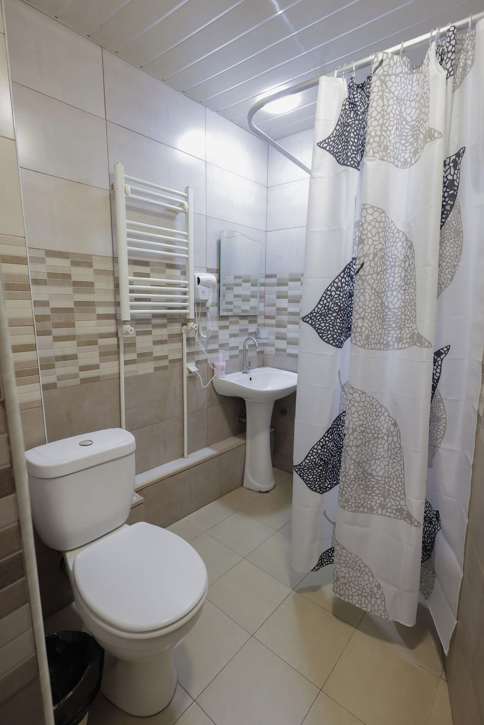 Family Room | Bathroom | Shower, hair dryer, slippers, towels