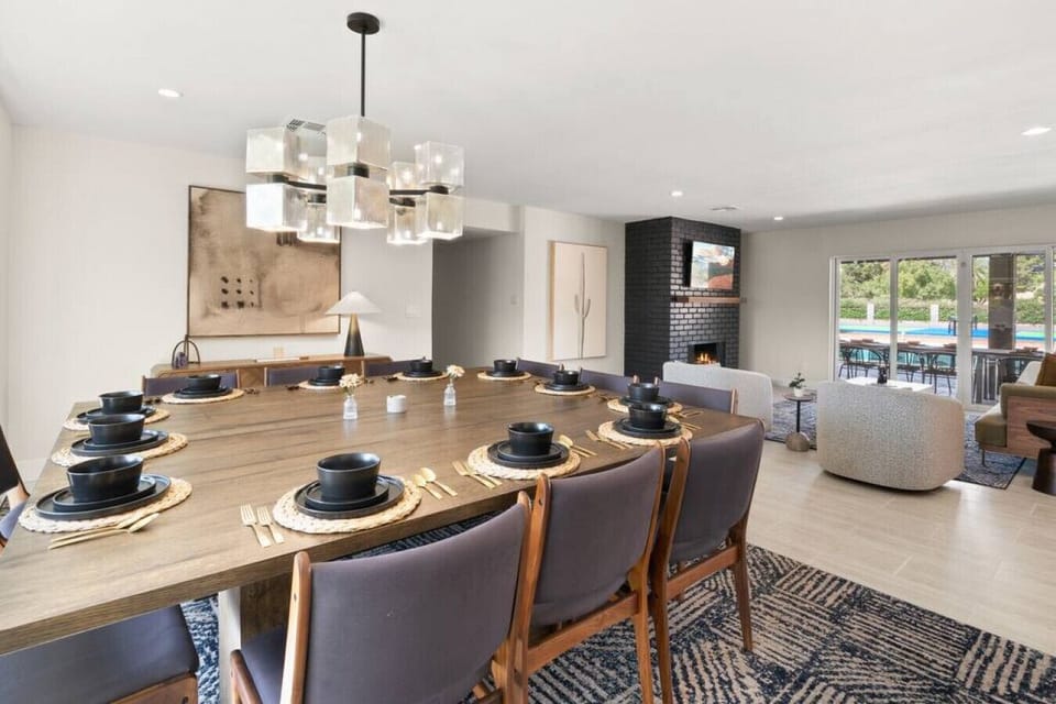 [Dining room] Main living and dining spaces with table seating for 12
