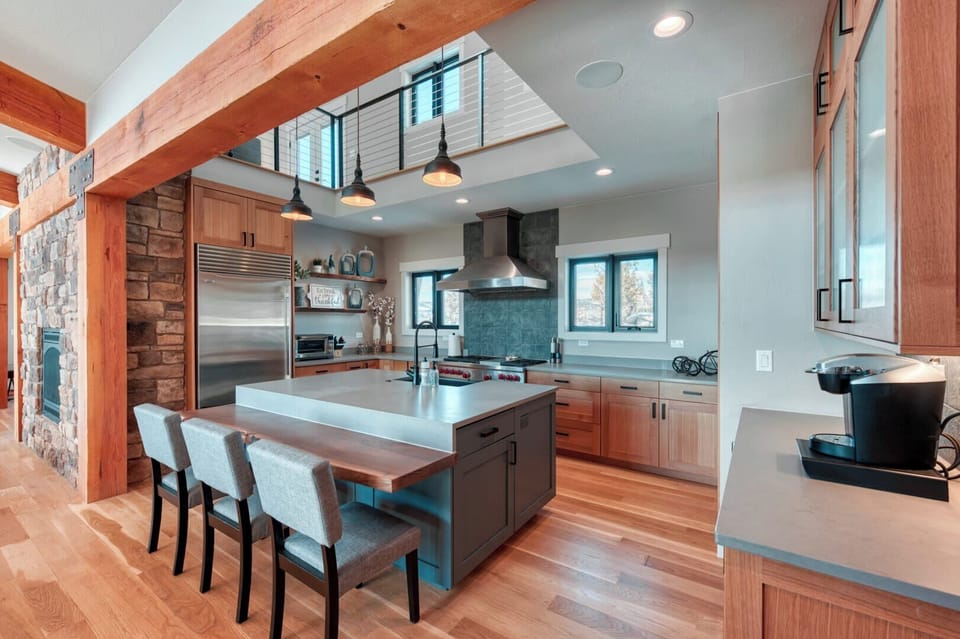 Cook up a feast in your gourmet kitchen, complete with modern appliances, ample counter space, and integrated bar seating.