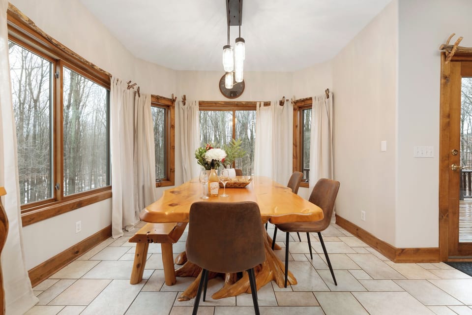 Dining area with a handcrafted table—an easy place for shared meals, board games, and lingering conversation.