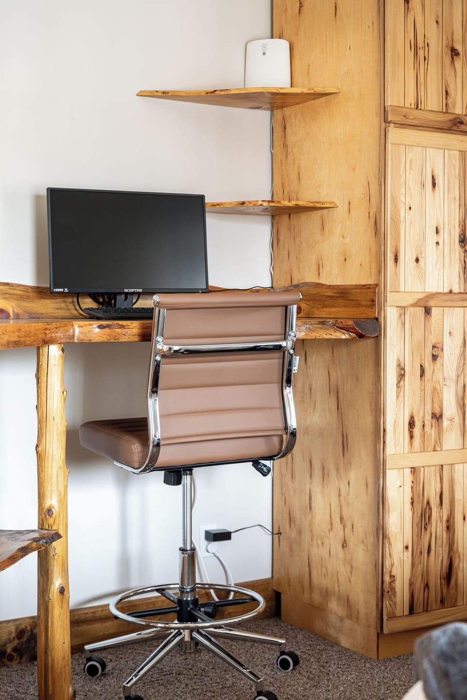 In-bedroom workspace with desk and chair—convenient for remote work or quiet planning time.