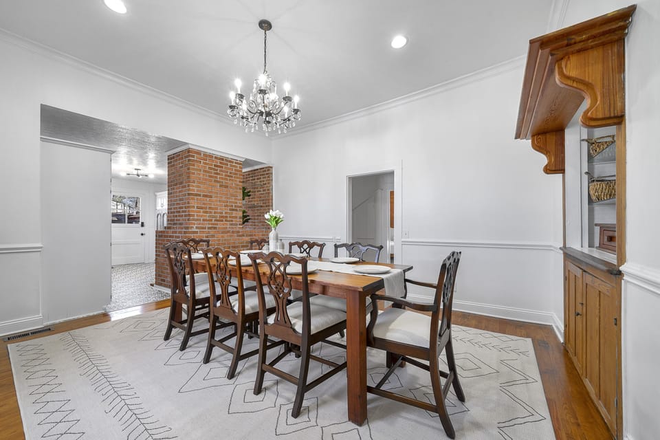 Enjoy your meals with seating for 8 in this classic styled dining room.