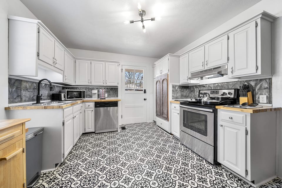We have 100 year old backsplash and cabinet door to match the age of the house.