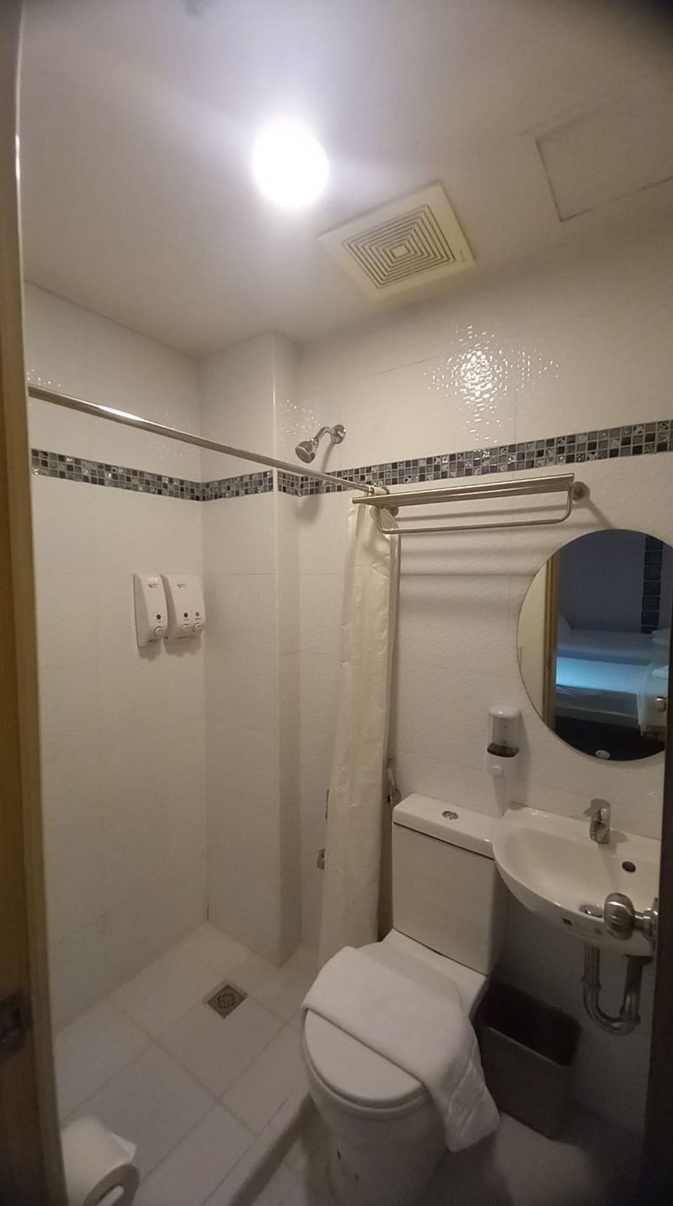 Shower, rainfall showerhead, towels, toilet paper