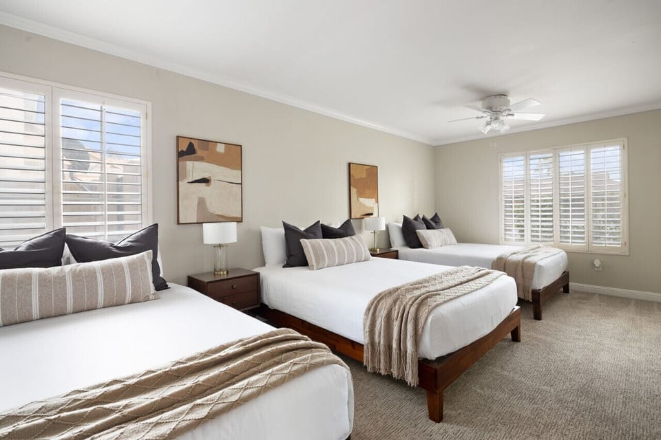 Efficiency at its finest . Our property designer made sure to maximize space with three beds in one room. Perfect for accommodating guests or a large family.