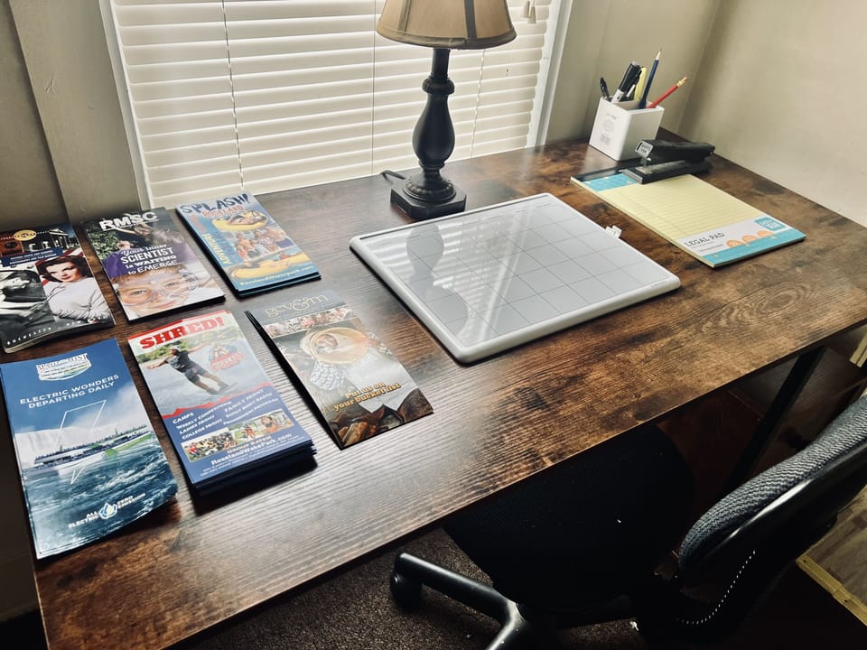This room has a small workspace side room connected.