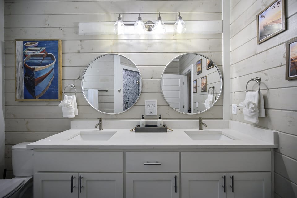 Master Bathroom: Dual sinks meet sleek design, perfect for a refreshing retreat!