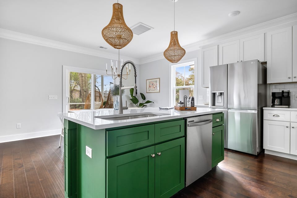 Grand sink and refrigerator that makes craft ice for cocktails. 