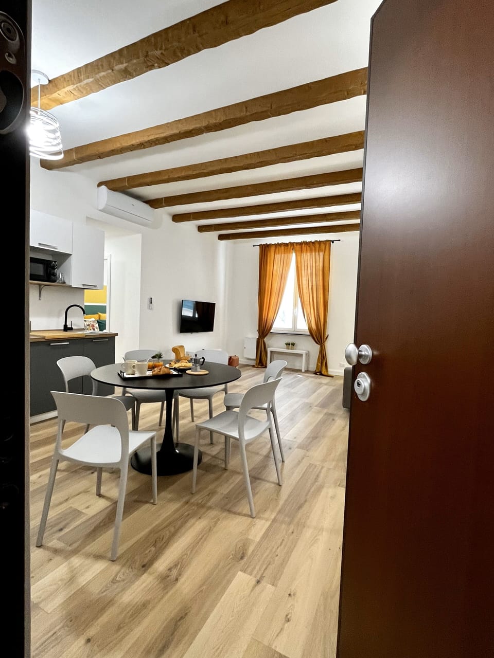 Family Apartment | Living area | 50-inch flat-screen TV with cable channels, TV, toys