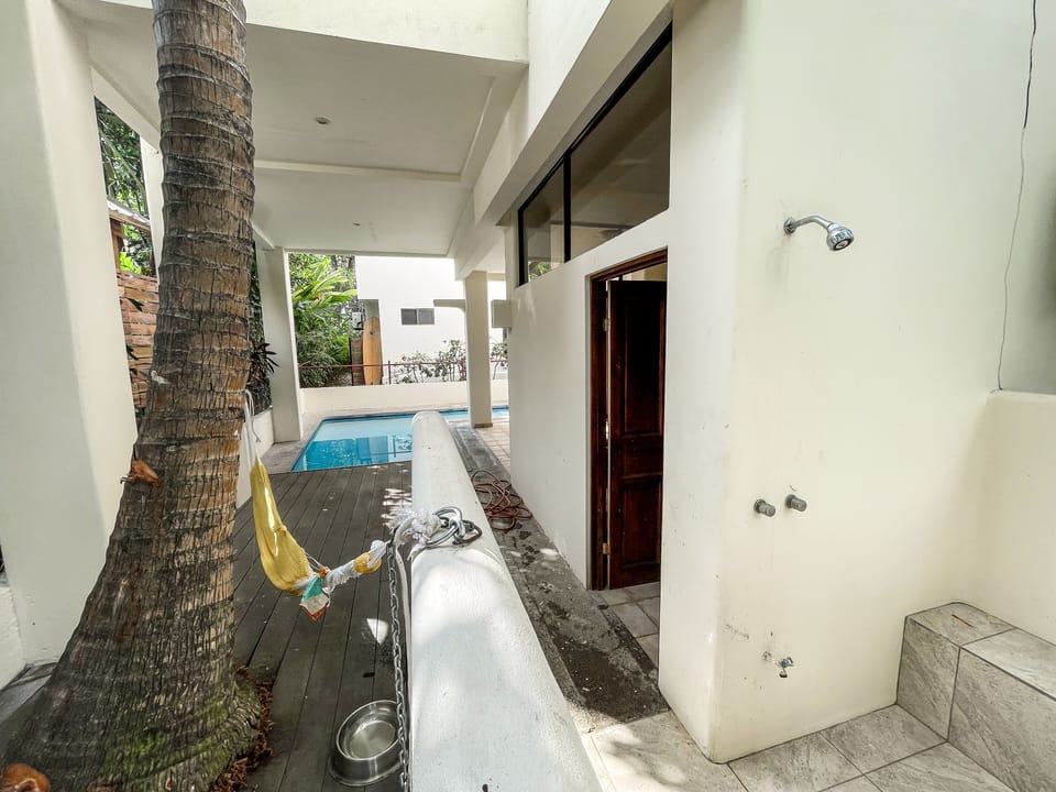 outside shower, pool and deck