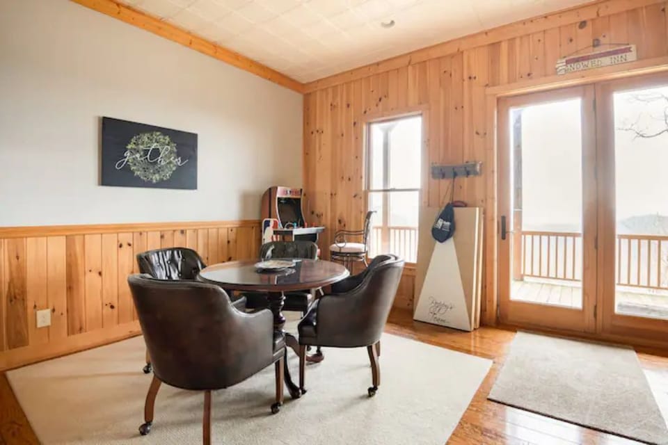 Downstairs area perfect for extra eating space or playing video arcade game.