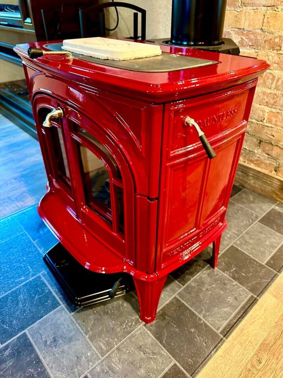 One of our most-loved features is the beauty and warmth of this Vermont Castings High-efficiency wood-burning stove. Wood provided free of charge