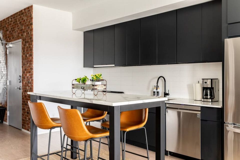 Fully equipped kitchen for all of your cooking needs! Two dining tables available to sit at.