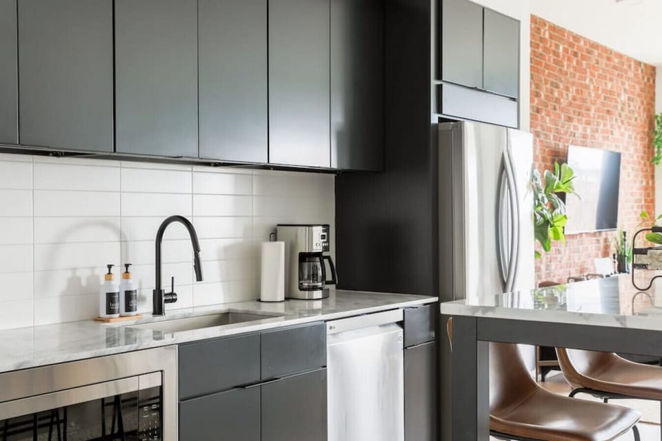 Fully equipped kitchen for all of your cooking needs! Two dining tables available to sit at.