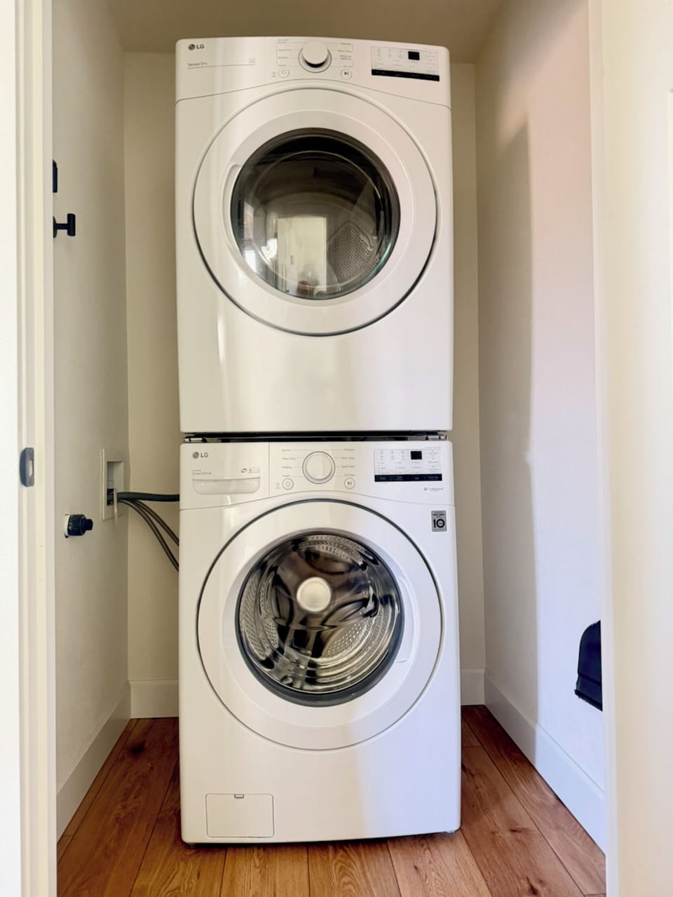 In-unit LG washer & dryer—modern, stacked convenience for easy stays.