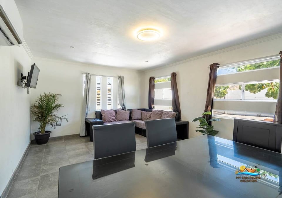 Enjoy seamless entertaining at Casa Ashley in downtown San Felipe Baja California Mexico — the dining table connects directly to the living room so no one misses out on the conversation.